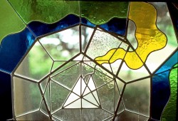Autonomous stained glass: "Platonic Plaything", 2.5' diameter, location unknown.