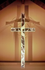 Mirror-lit, suspended stained glass Cross