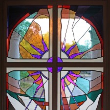 Upper half of Narthex window: German mouthblown glass, dichroic glass “flames”.