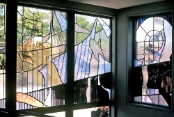 Corner view of 3 of 7 windows made with German mouthblown glass.