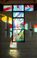 Southwest window at sunrise. Made with imported mouthblown glass and prisms.
