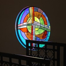 "Oasis Cross" in stairwell. Made from imported European glasses and prism.