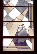 Detail: ”Trinity Triptych: Father" stained glass with Garden of Eden symbols.