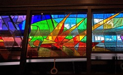 “SWFLW” window made with imported mouthblown glass and Austrian lead-crystal prisms.