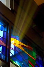 Morning sun on “SWFLW” stained glass with German mouthblown glass and prisms.
