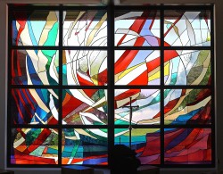 "Creation": a stained glass window of imported mouthblown German glass (composite photo).