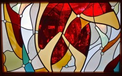 "Helconia" stained glass bathroom window. German mouthblown glass & lenses.