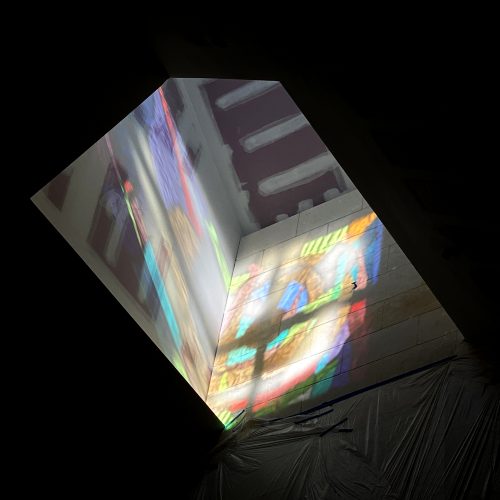 Once we were back on solid ground, even though this was still a busy construction site, we could see that the Skylight was going to exceed expectations. In the low winter sun, its colorful projections barely escape the light shaft. Just wait until the Summer Solstice!
