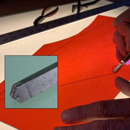 Of all the glazier's tools, the glass cutter has undergone the most change since Gothic times. Diamond-tipped cutters of the 14th-16th centuries were replaced in 1869 by the wheel cutter. Look closely for the small carbide-steel wheel at the tip of the cutter head. It's only about 1/8