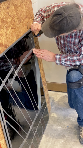 SIGNING THE WINDOWS FOR CHRIST CHURCH: Date and signature can be found in the lower right corner of the 4th Transom Window which was the last of the stained glass to be installed.