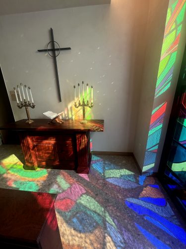 Notice sprinkling of rainbows projecting from prisms in the stained glass. Photo courtesy Rhotenberry Wellen Architects, Midland.